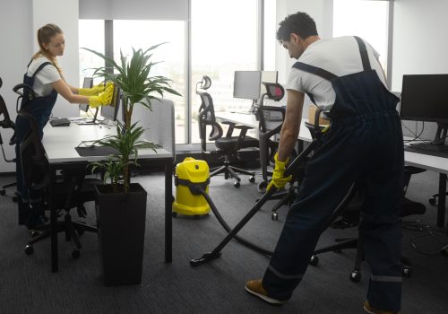 full-shot-people-cleaning-office
