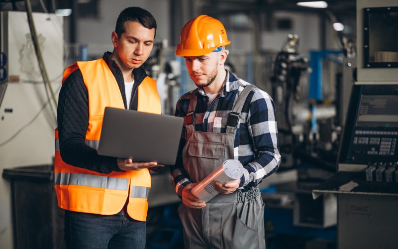 Two colleagues at a factory